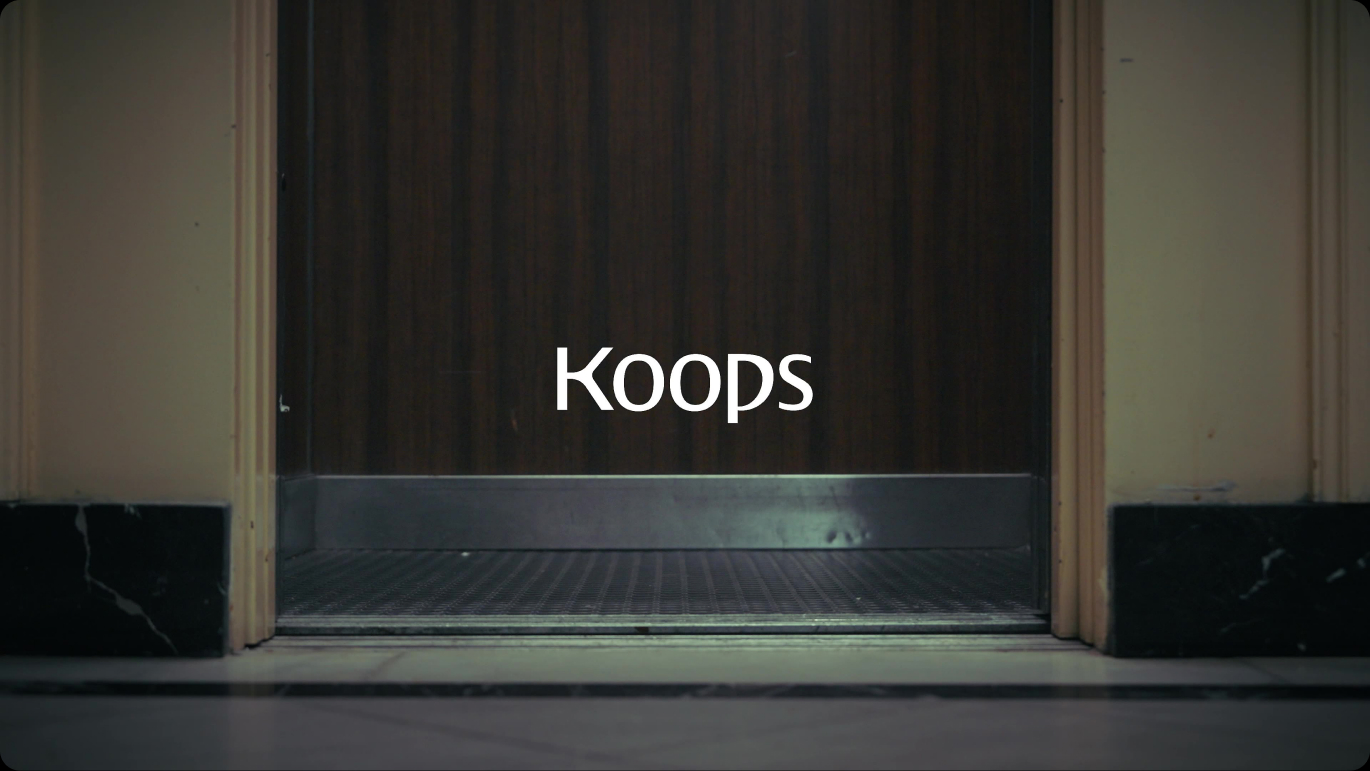 Koops brand reveal on elevator doors